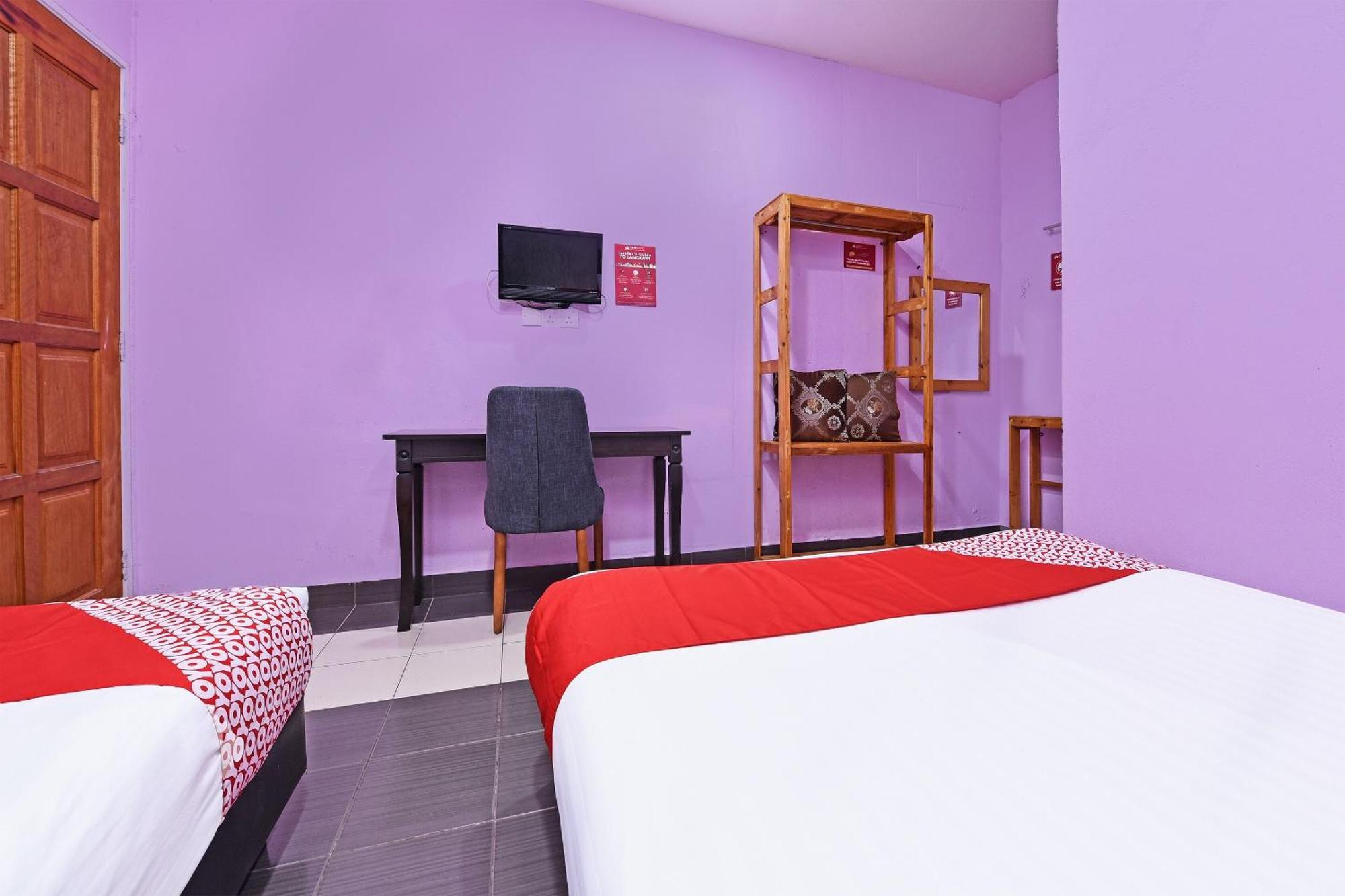 OYO 90561 Awan Biru Motel Pantai Cenang  Bagian luar foto